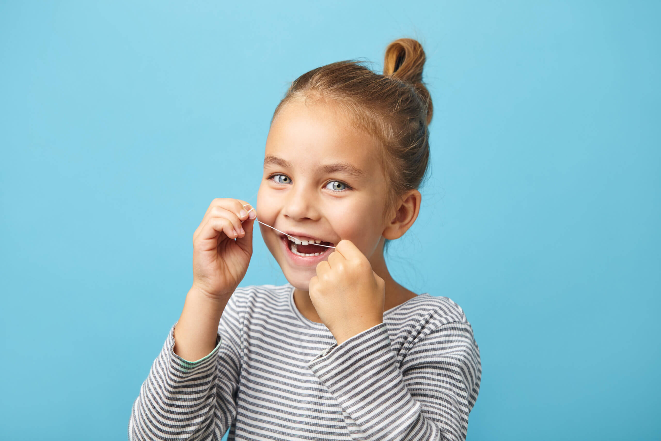 The Importance of Flossing for Children's Dental Health The Kid Dentist
